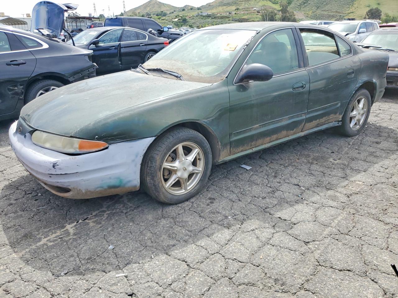 2000 Oldsmobile Alero GLS, VIN 1G3NF52E3YC392279 — Мелкие вмятины и царапины