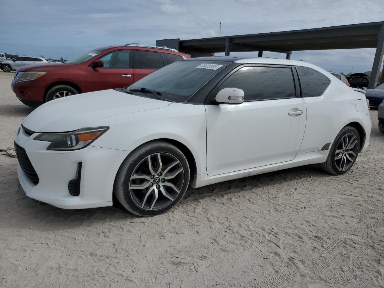 2014 Scion tC, VIN JTKJF5C71E3079606 — Side