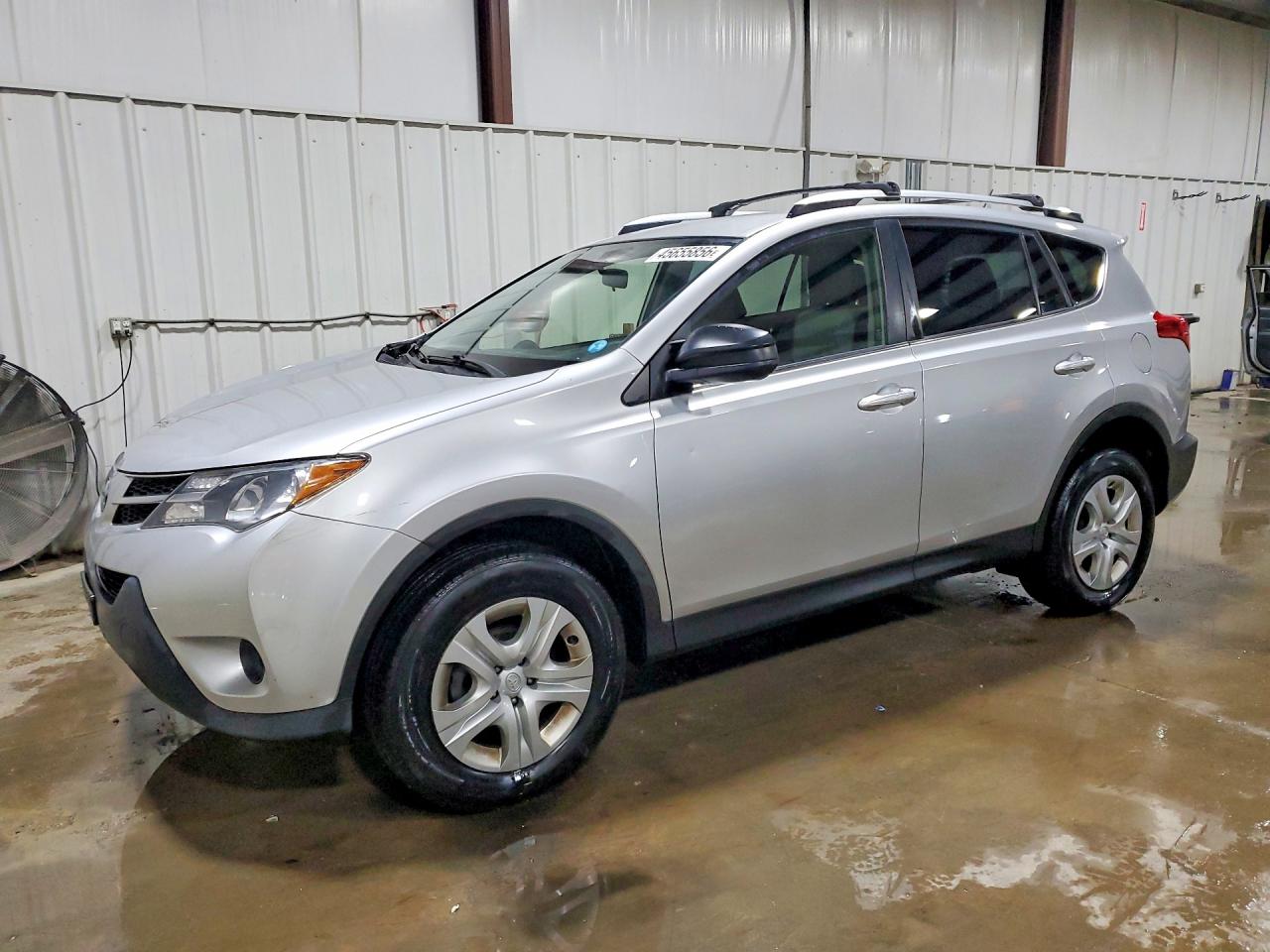 2014 Toyota RAV4 LE, VIN JTMBFREV1ED053810 — Side