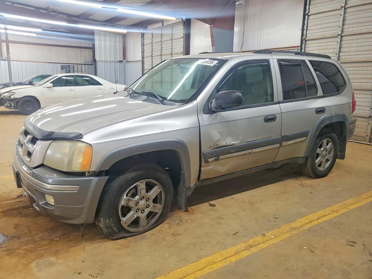 2005 Isuzu Ascender S, VIN 4NUDS13S152700625 — Бок