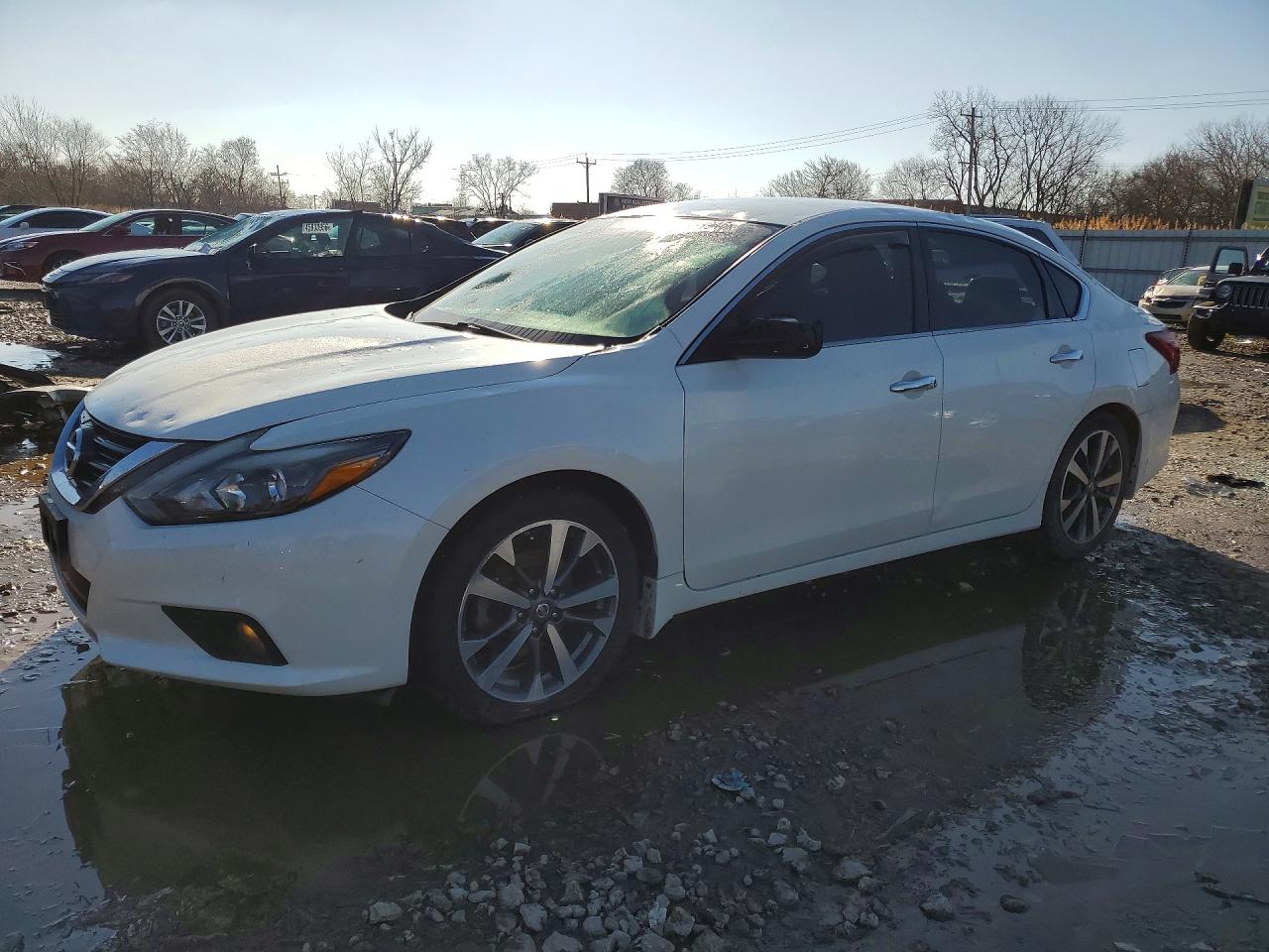 2017 Nissan Altima SR, VIN 1N4AL3AP5HC133443 — Hail