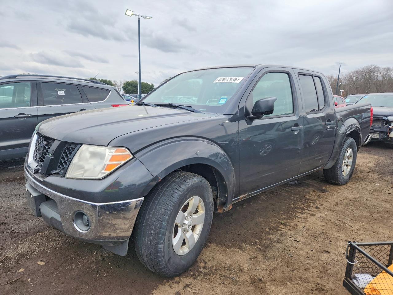 2010 Nissan Frontier LE, VIN 1N6AD0EV5AC441097 — Minor dents and scratches
