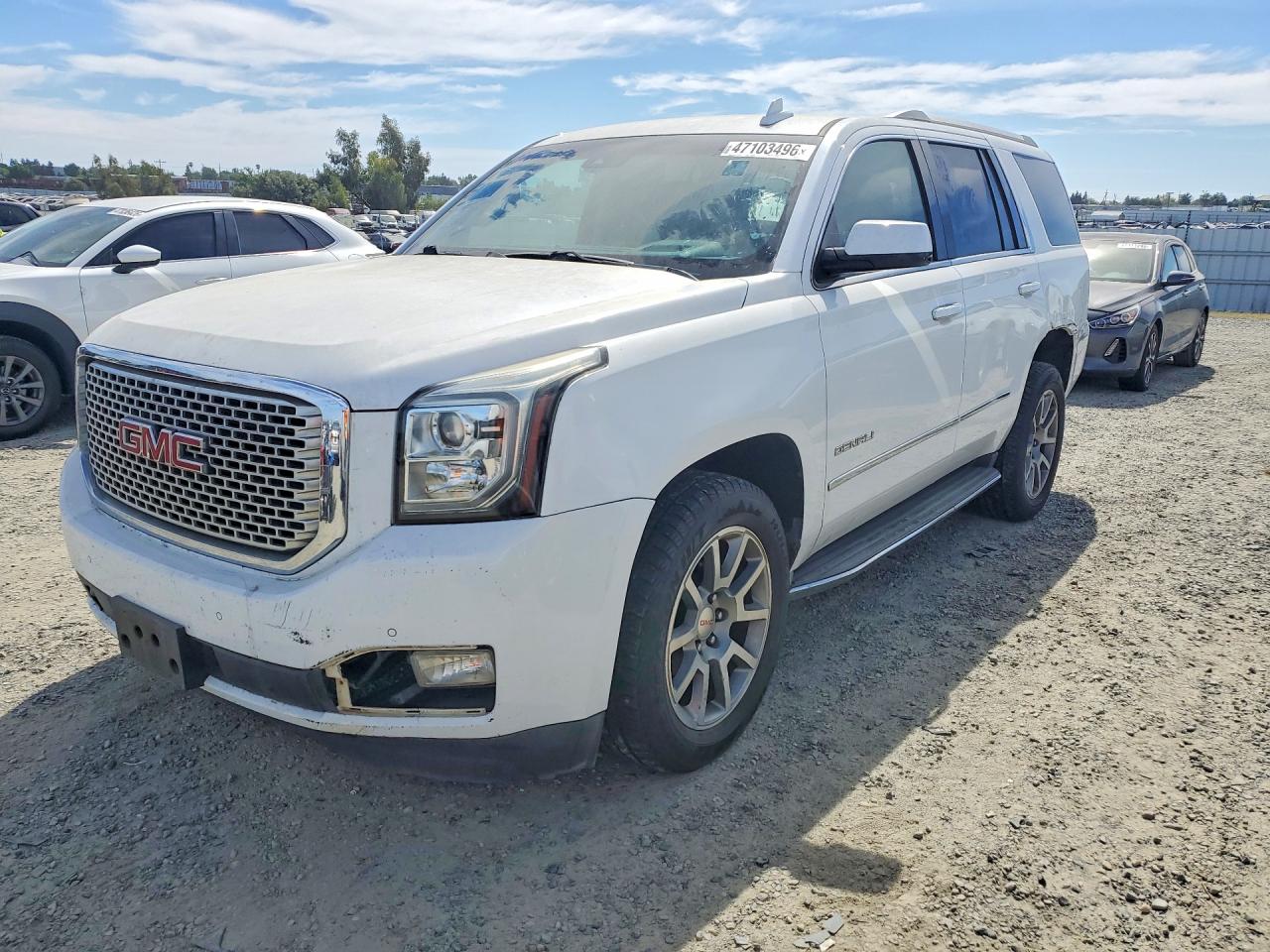 2017 GMC Yukon Denali, VIN 1GKS1CKJ4HR116312 — Rear end