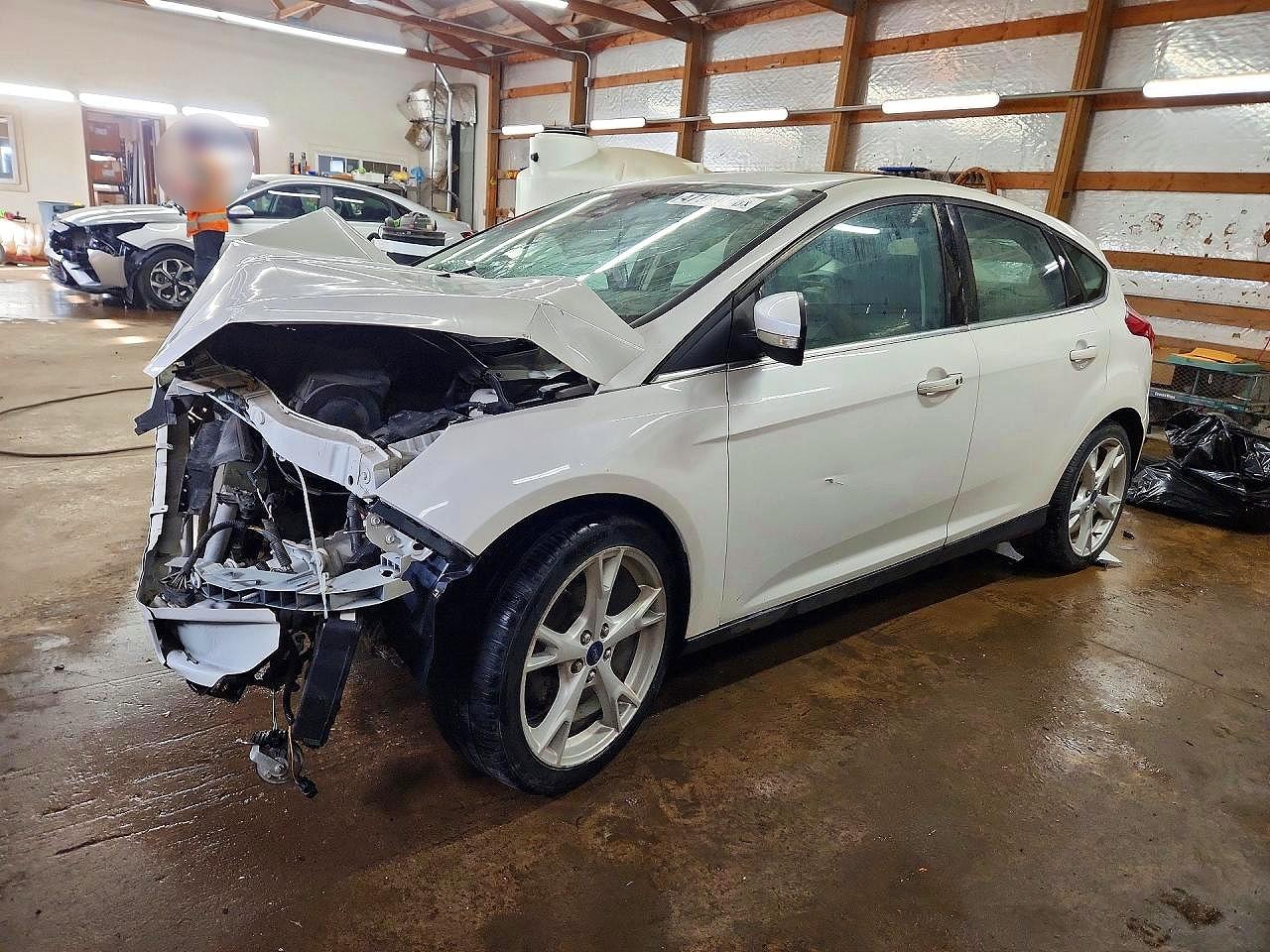 2015 Ford Focus Titanium, VIN 1FADP3N27FL303508 — Front end