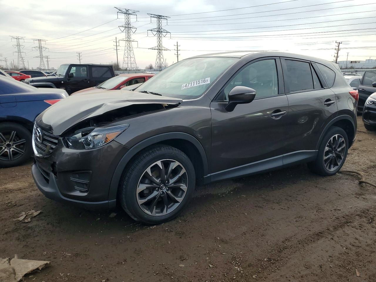 2016 Mazda CX-5 Grand Touring, VIN JM3KE4DY9G0650285 — Front end