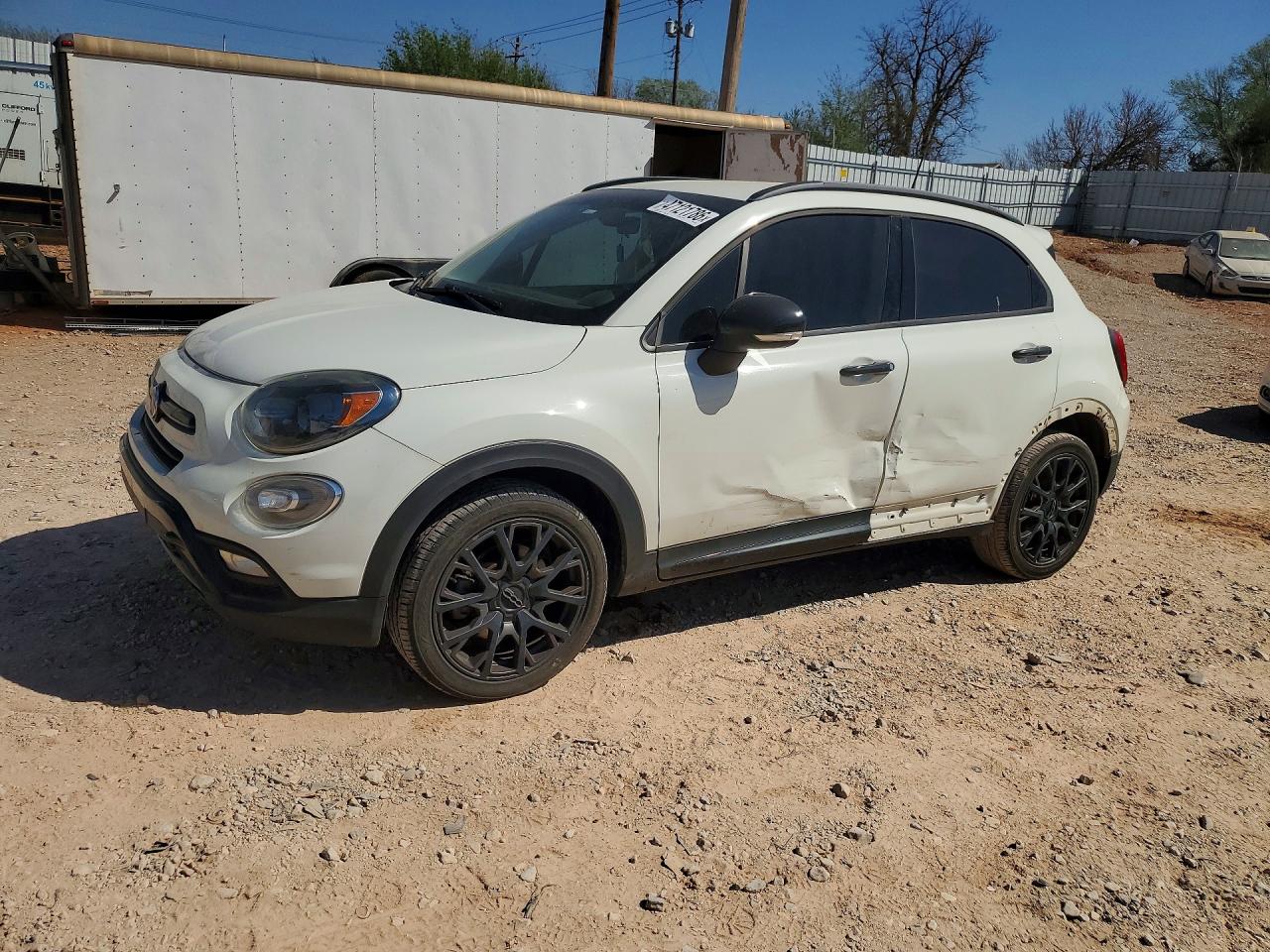 2018 FIAT 500X Urbana Edition, VIN ZFBCFXCB9JP695978 — Бок