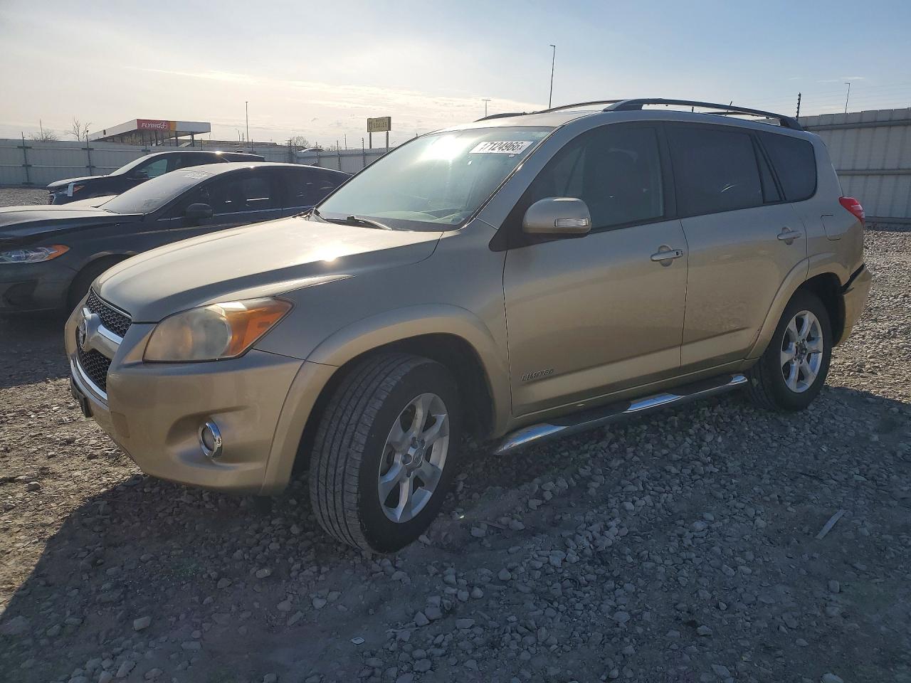 2009 Toyota RAV4 Limited, VIN JTMBF31V49D013424 — Minor dents and scratches