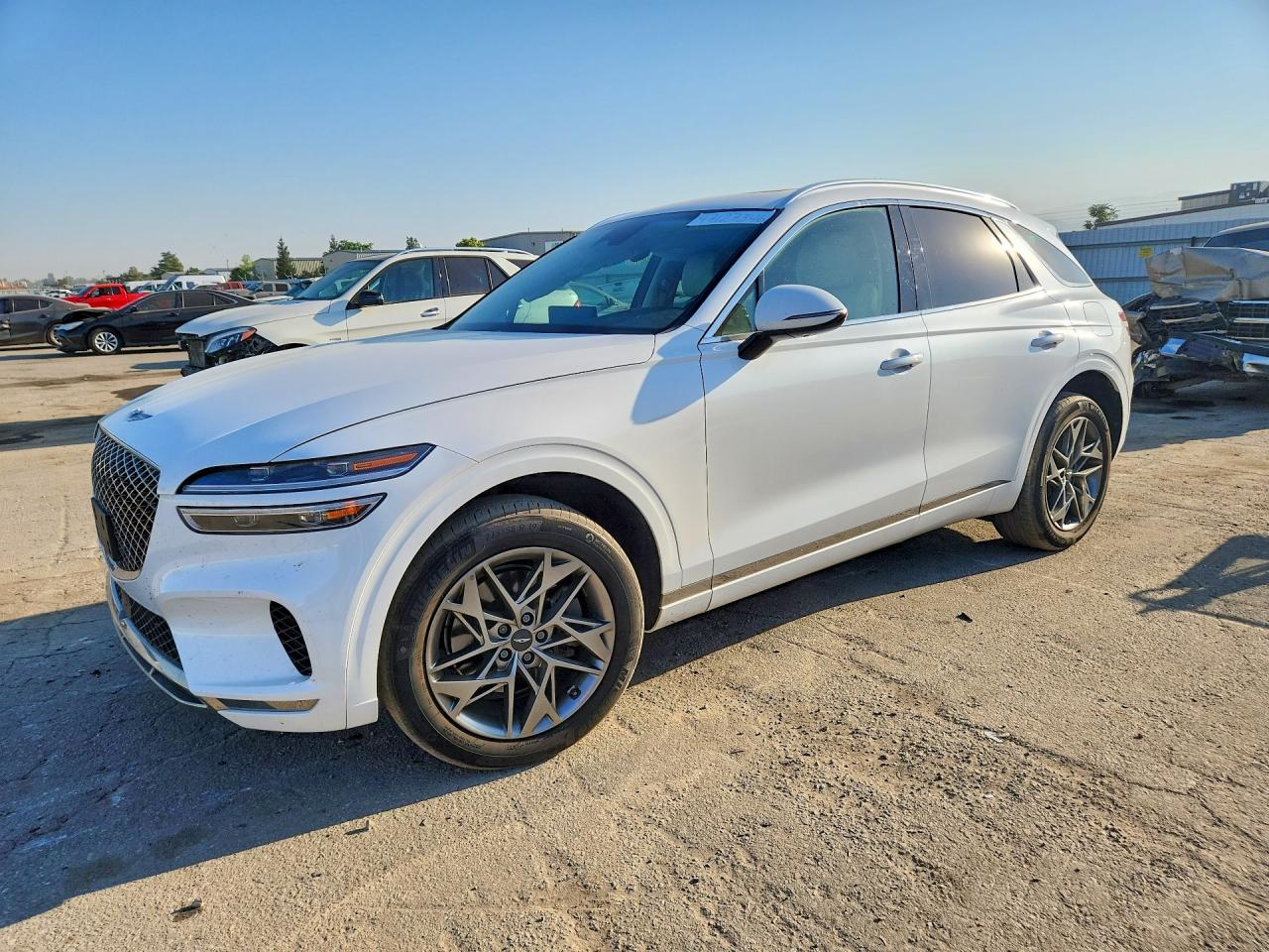 2022 Genesis GV70 2.5T, VIN KMUMADTB1NU075323 — Side