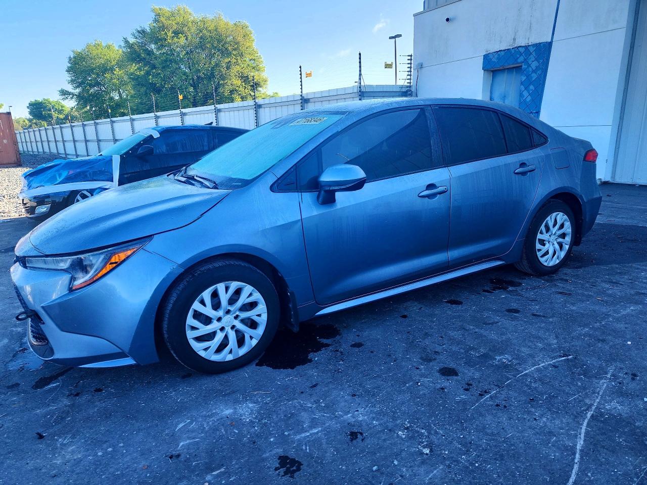 2021 Toyota Corolla LE, VIN JTDEPMAE2MJ153577 — Side