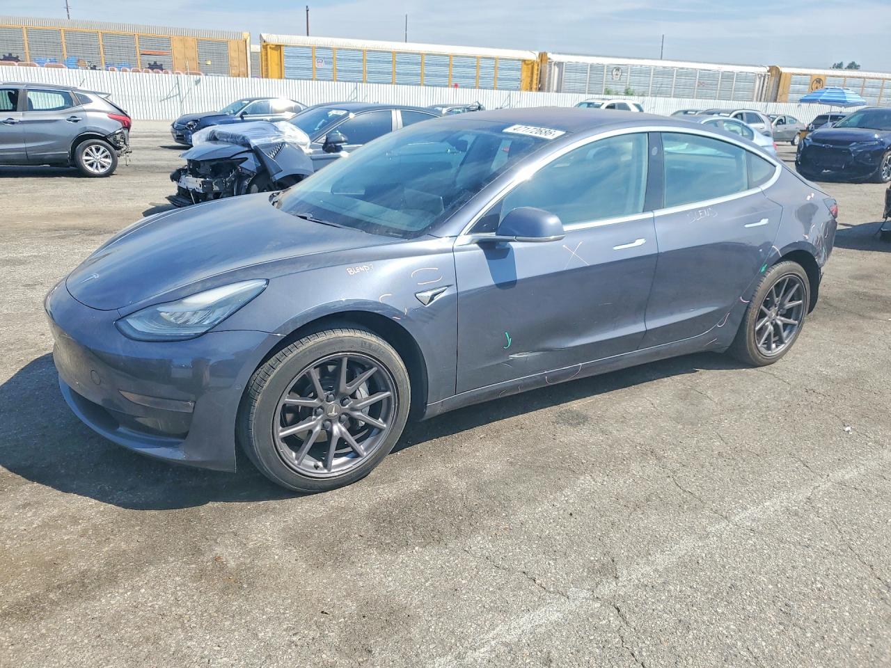 2018 Tesla Model 3 Long Range Battery, VIN 5YJ3E1EA6JF158271 — Rear end