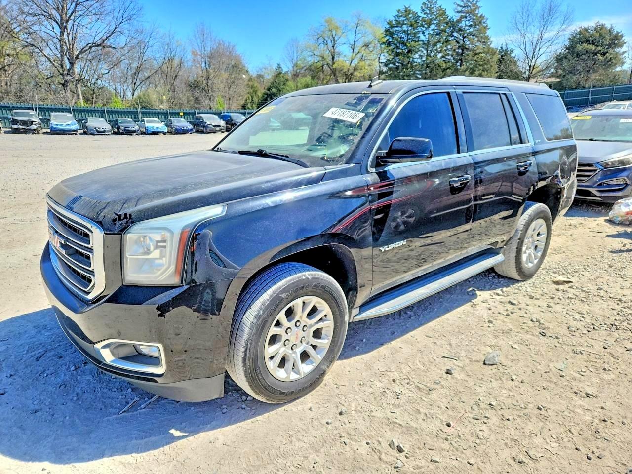 2015 GMC Yukon SLT, VIN 1GKS1BKC1FR252843 — Rear end