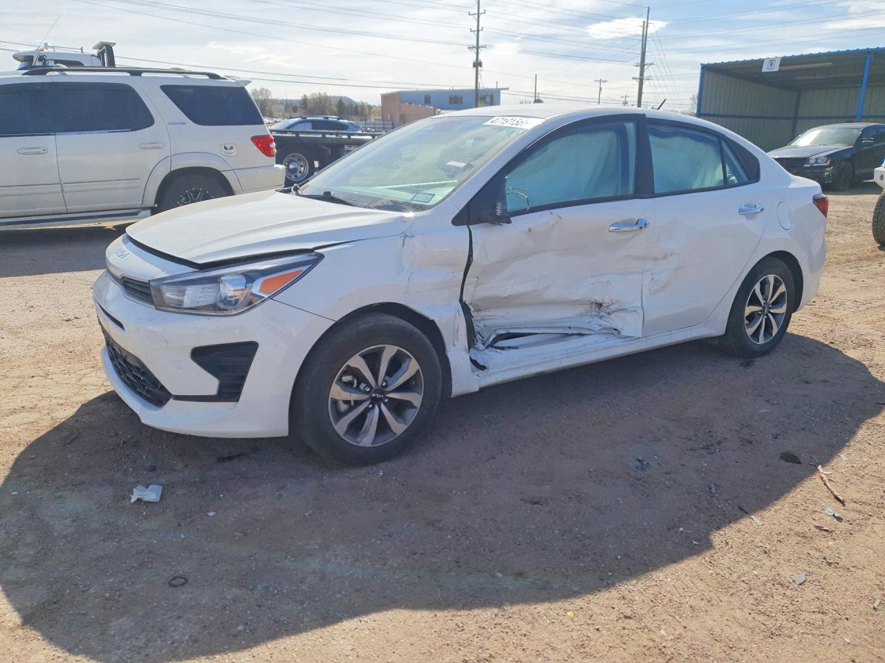 2023 Kia Rio S, VIN 3KPA24AD2PE602777 — Side