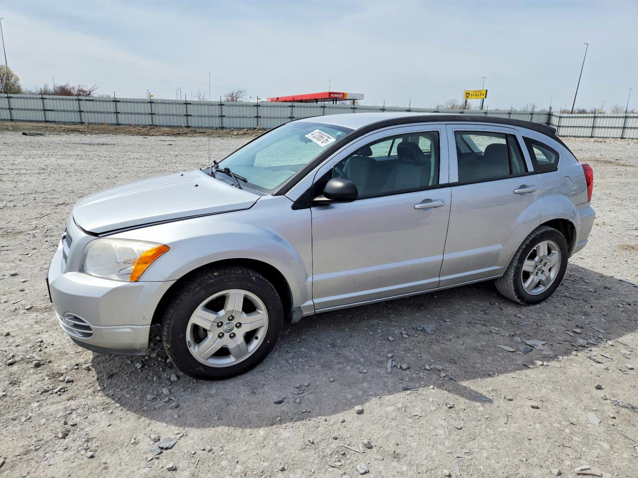 2009 Dodge Caliber SXT, VIN 1B3HB48A19D164589 — Град