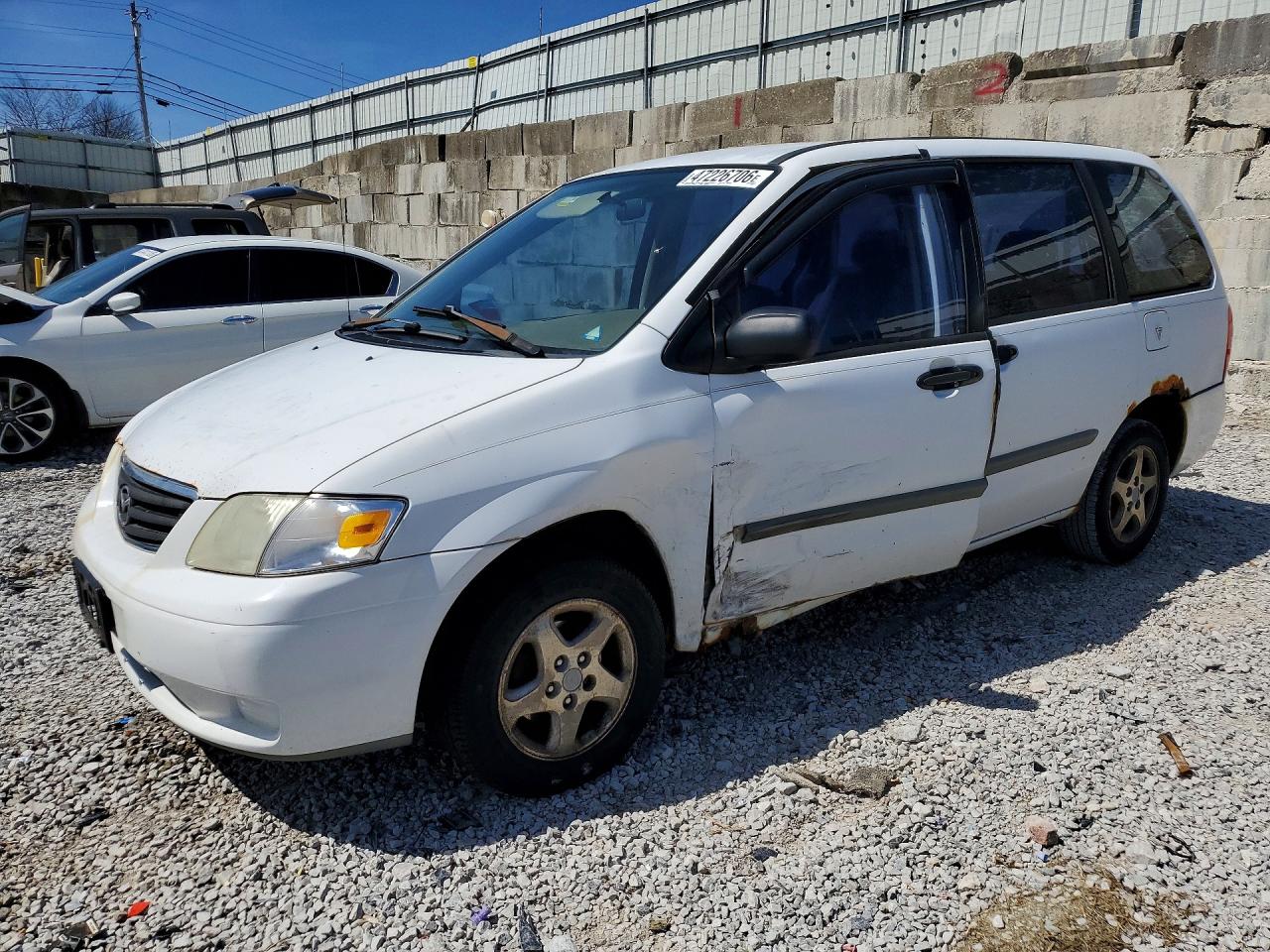 2001 Mazda MPV DX, VIN JM3LW28G110209233 — Side