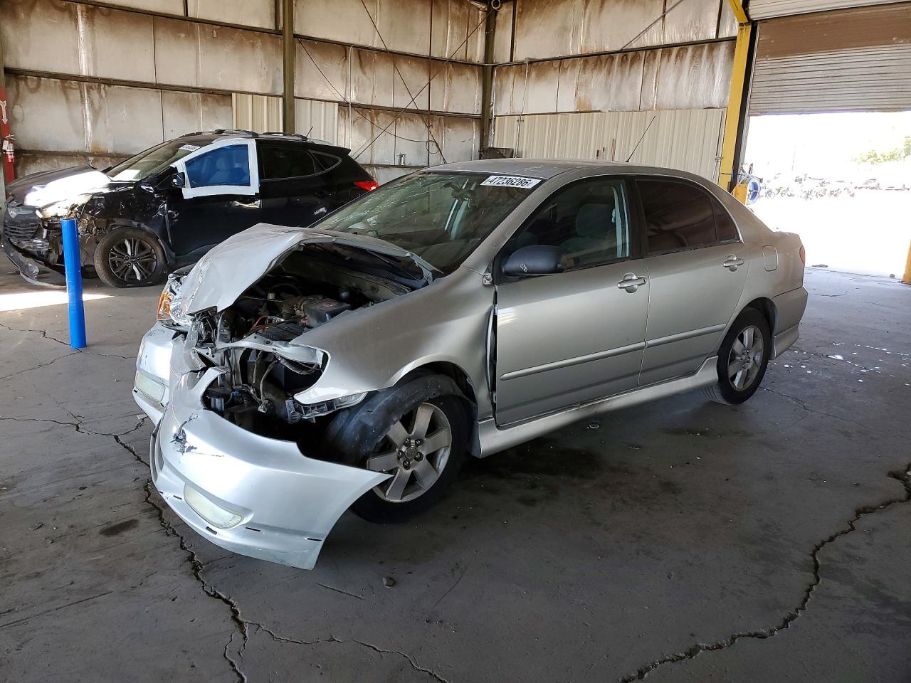 2003 Toyota Corolla LE, VIN 1NXBR32E73Z107726 — Front end