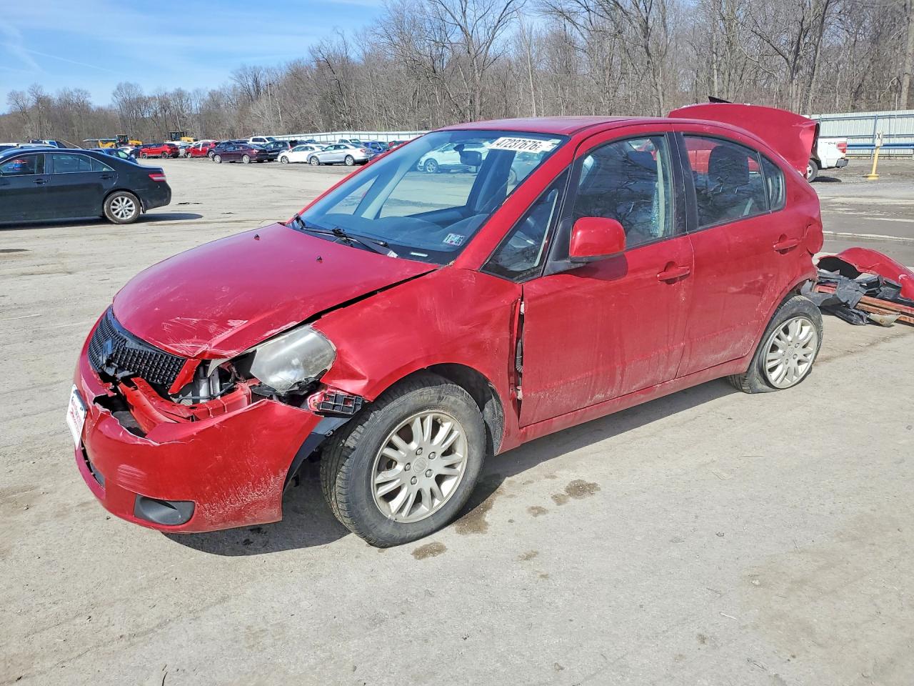 2012 Suzuki SX4 LE, VIN JS2YC5A35C6300477 — Rear end