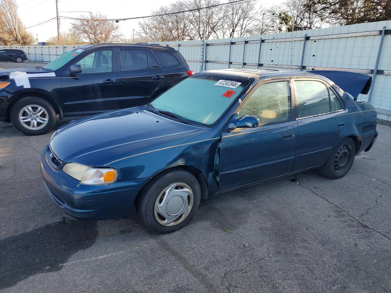 1998 Toyota Corolla LE, VIN 2T1BR18E7WC009510 — Зад