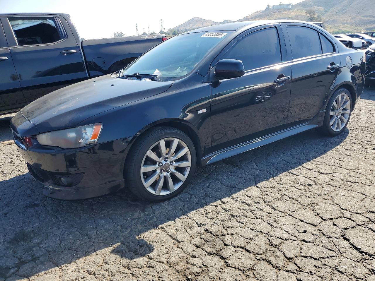 2011 Mitsubishi Lancer GTS, VIN JA32U8FW9BU044659 — Minor dents and scratches