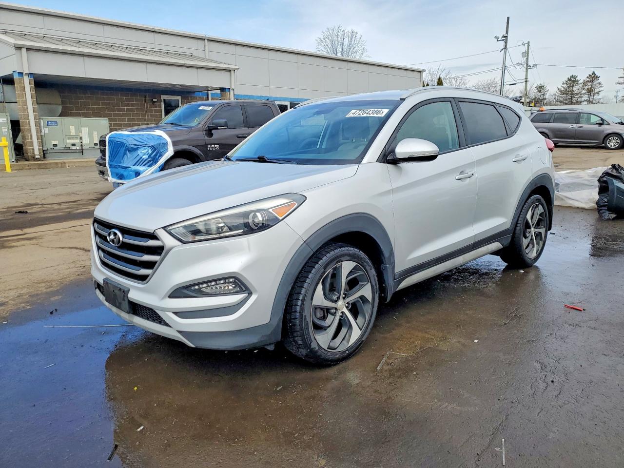 2018 Hyundai Tucson Sport, VIN KM8J3CAL6JU771154 — Side