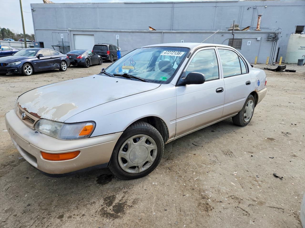 1997 Toyota Corolla CE, VIN 1NXBA02E3VZ519828 — Side
