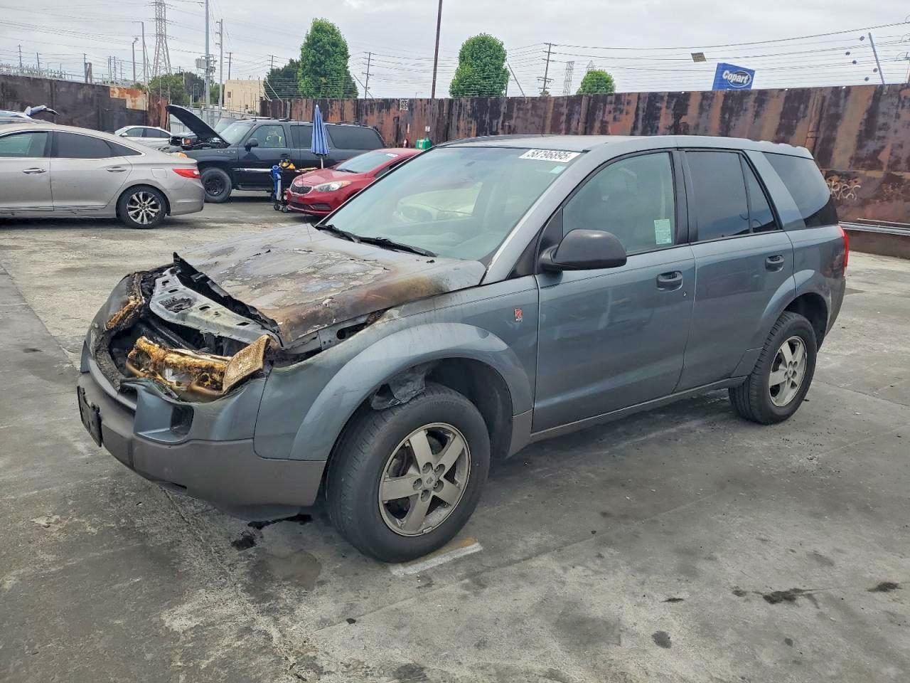 2005 Saturn VUE, VIN 5GZCZ23D55S868034 — Engine fire