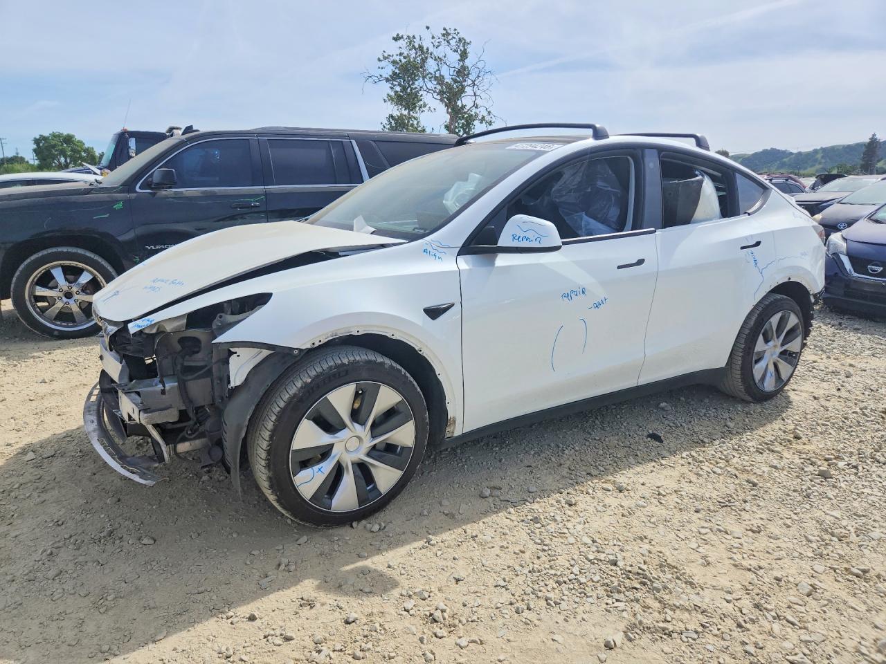 2023 Tesla Model Y Long Range, VIN 7SAYGDEE2PF600897 — Stripped