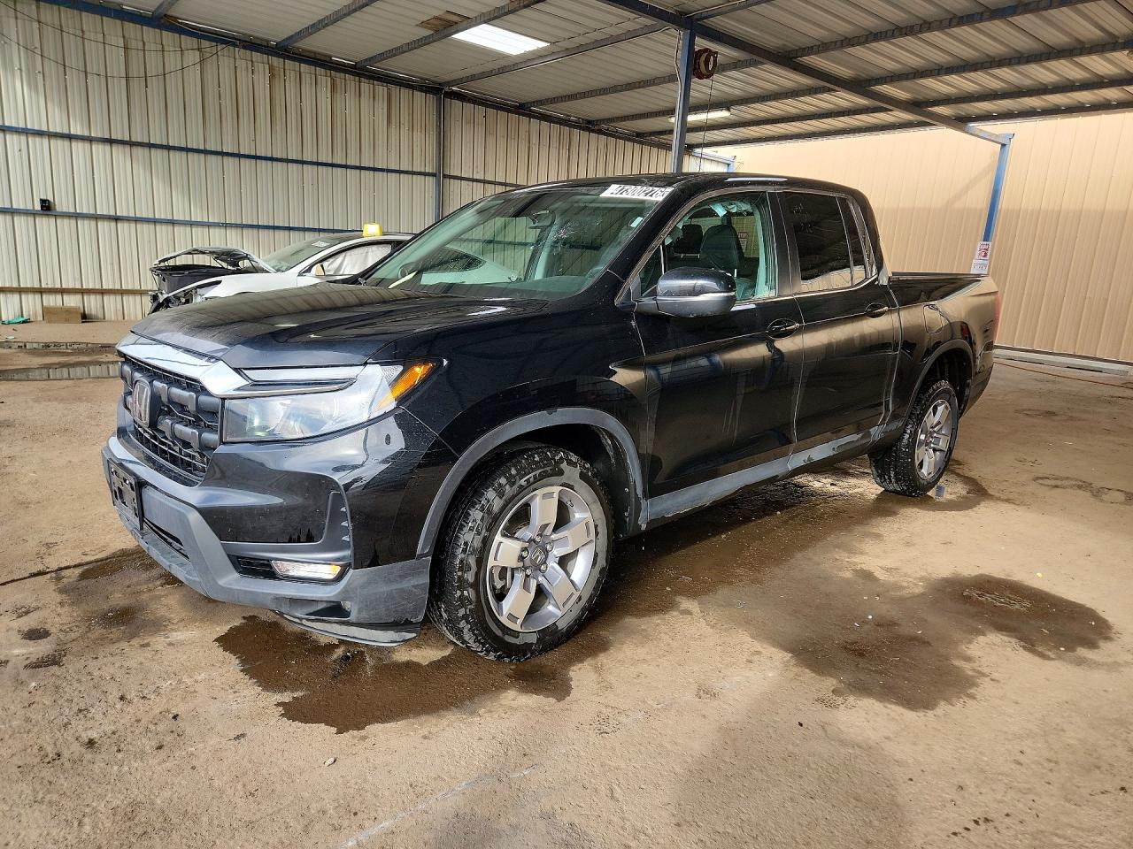 2025 Honda Ridgeline RTL, VIN 5FPYK3F50SB043394 — Front end
