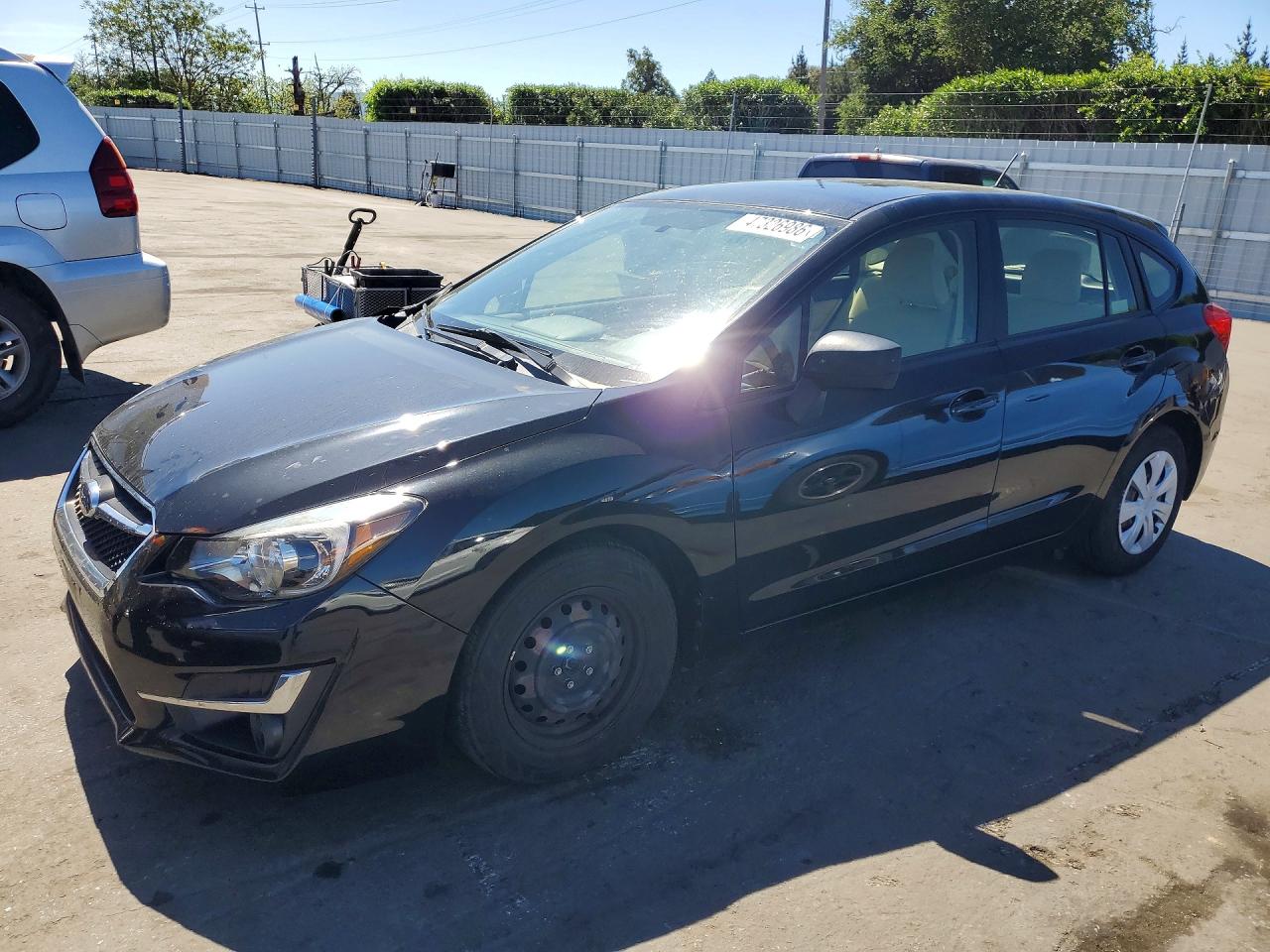 2015 Subaru Impreza 2.0i, VIN JF1GPAA69F8322008 — Side