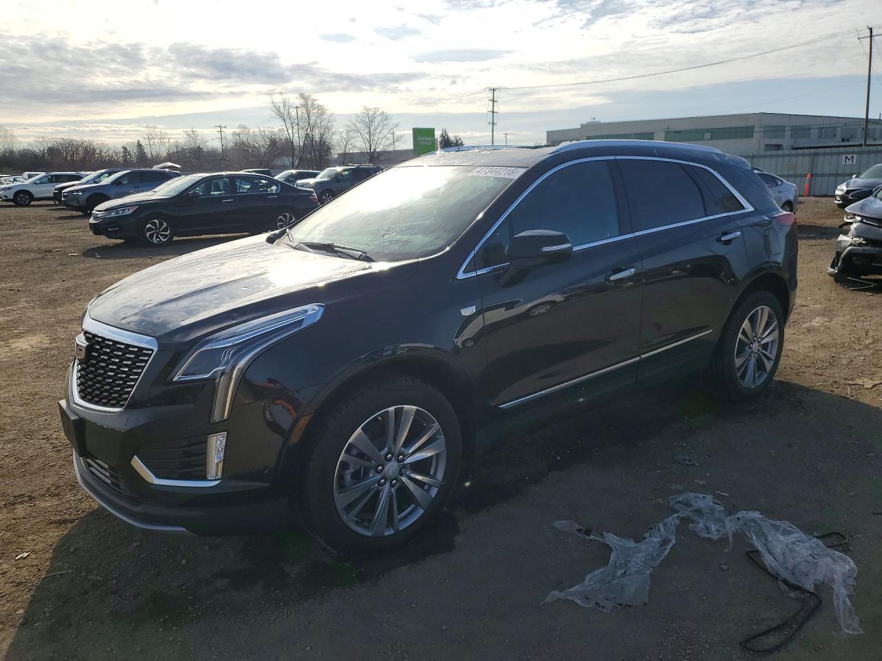 2026 Cadillac XT5 Premium Luxury AWD, VIN 1GYKNDR43TZ101602 — Hail