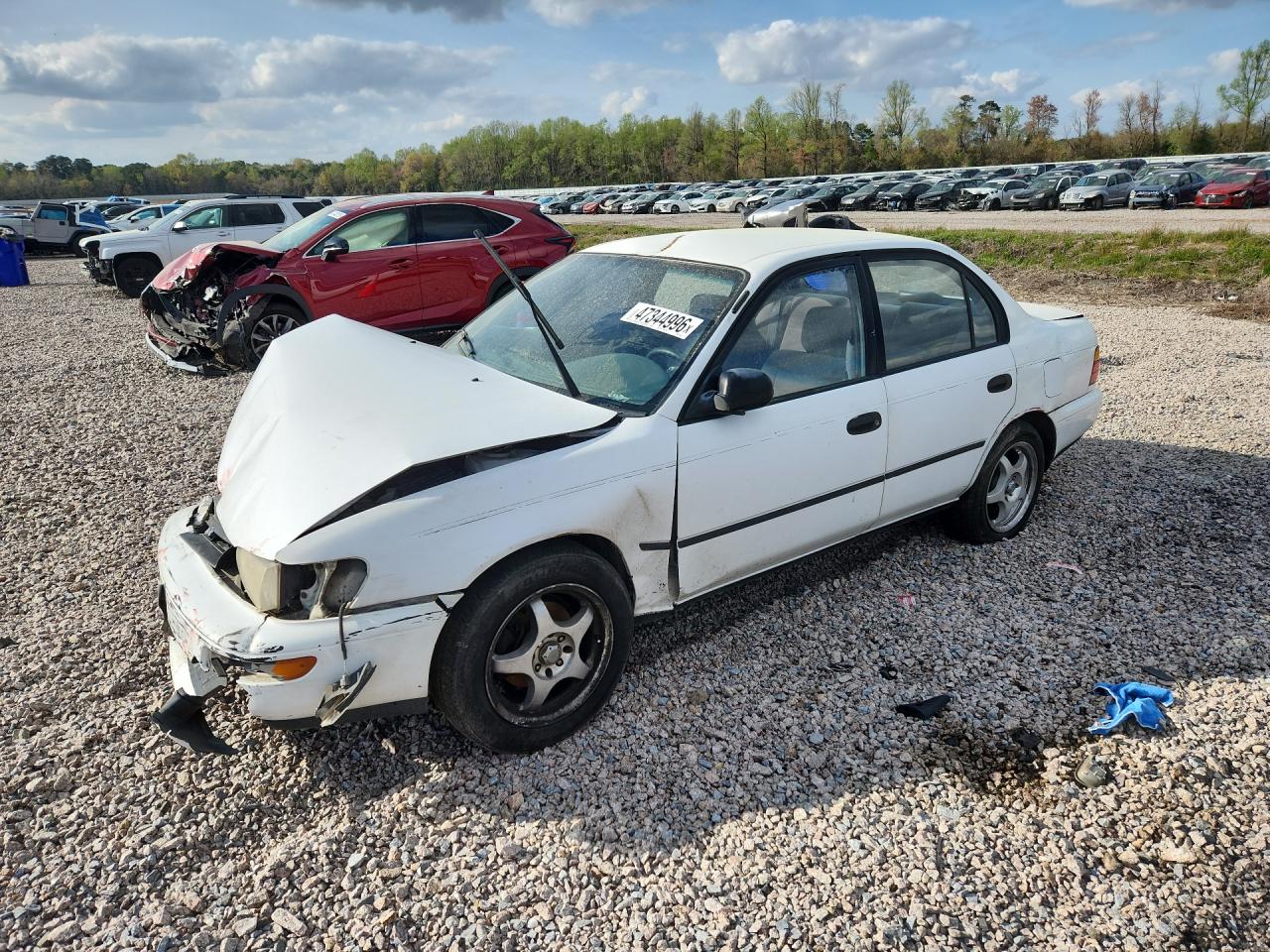 1995 Toyota Corolla DX, VIN 1NXAE09B7SZ316433 — Front end
