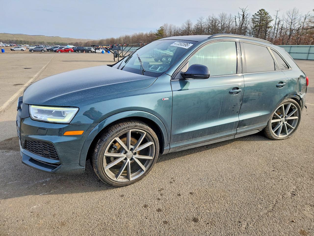 2018 Audi Q3 Premium Plus, VIN WA1JCCFS2JR028816 — Rear end