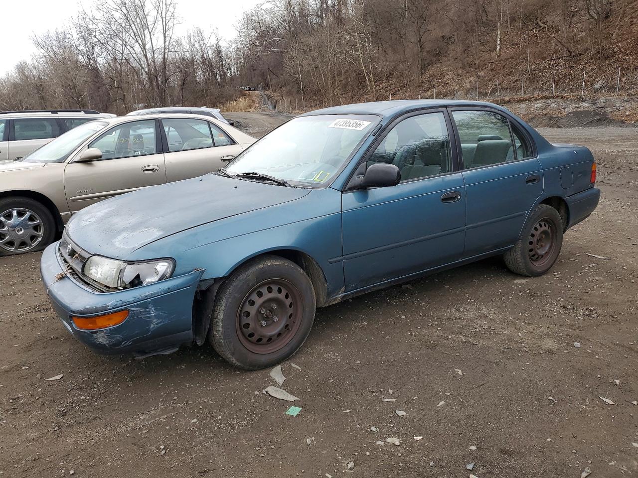 1995 Toyota Corolla DX, VIN 2T1AE09B2SC109627 — Front end