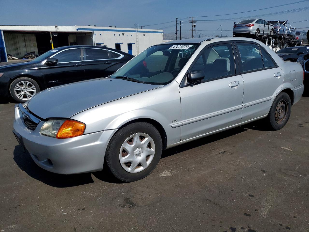 2000 Mazda Protege DX, VIN JM1BJ2228Y0288801 — Front end