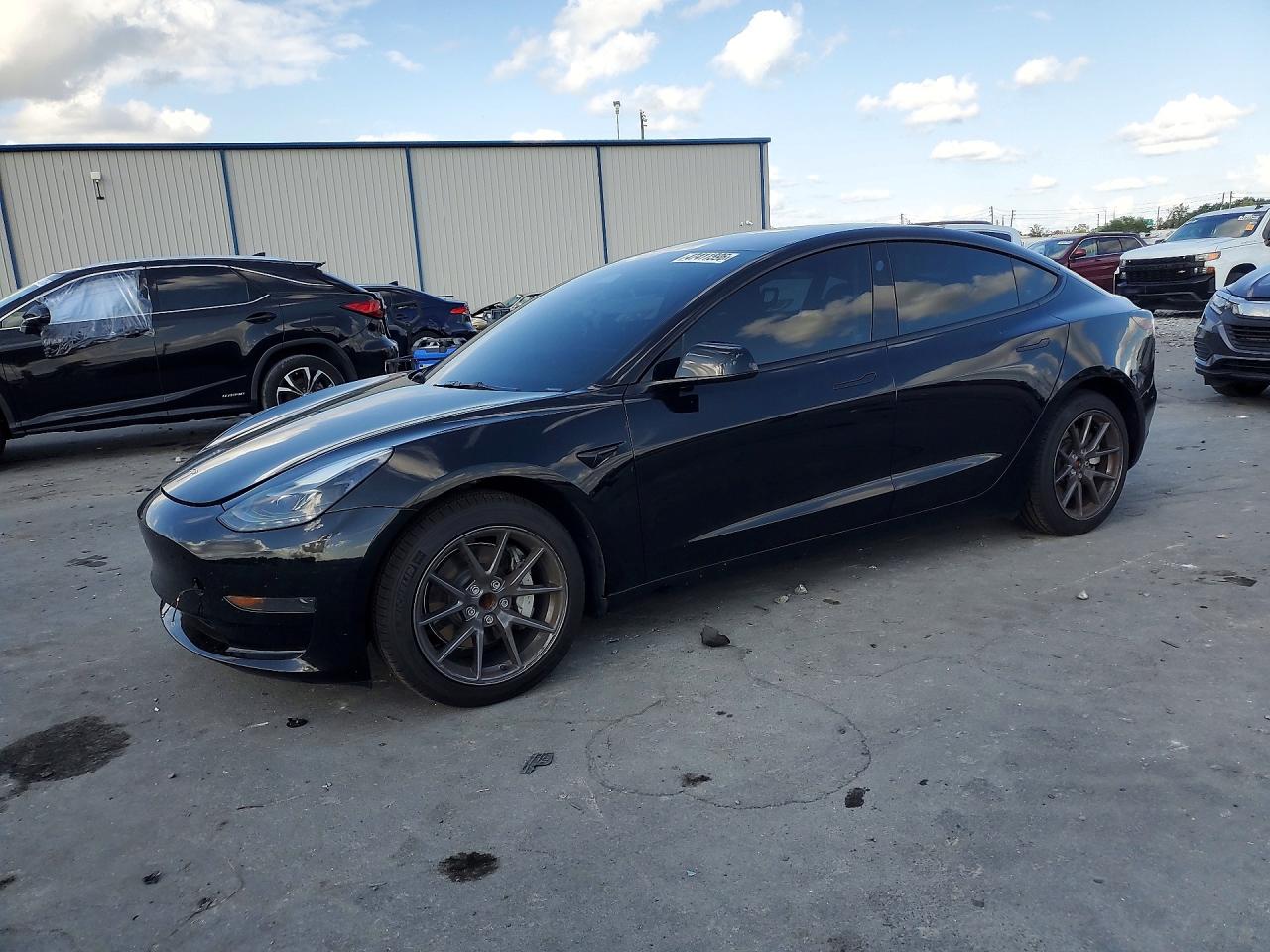 2023 Tesla Model 3, VIN 5YJ3E1EA5PF587037 — Minor dents and scratches