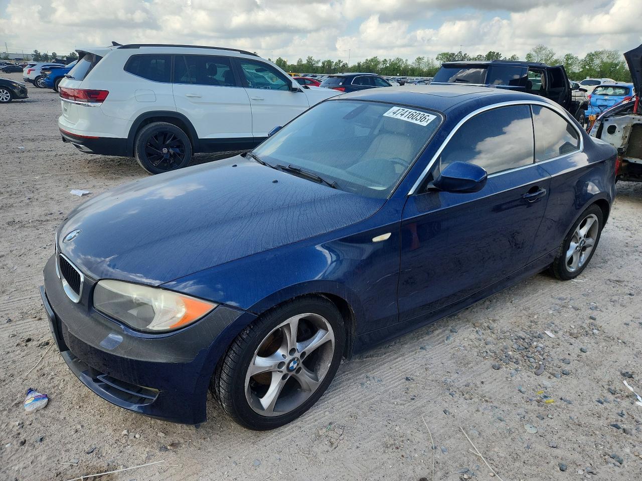 2011 BMW 1 Series 128i, VIN WBAUP7C58BVK78404 — Normal wear