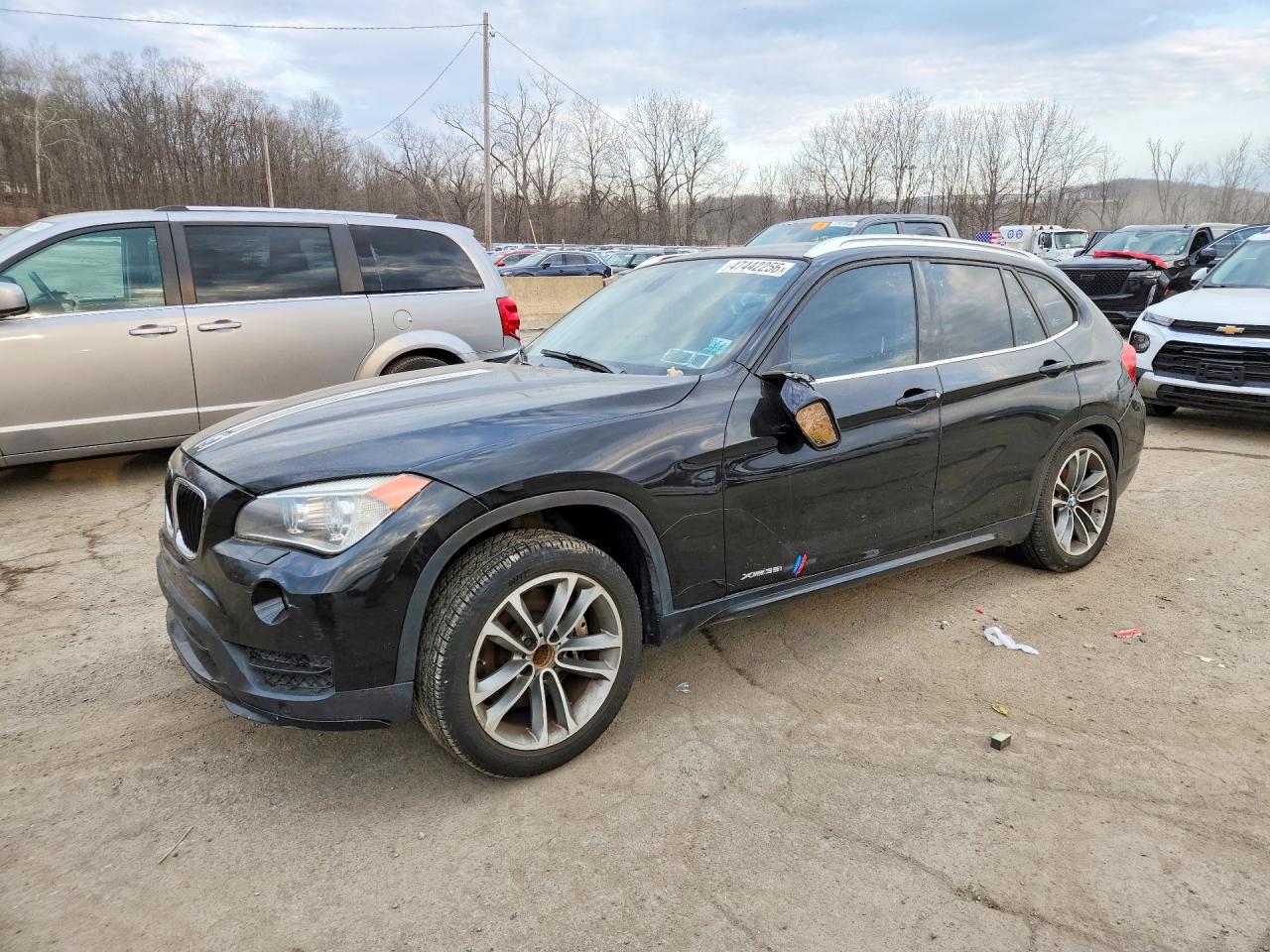 2015 BMW X1 xDrive35i, VIN WBAVM5C54FVV94728 — Зад