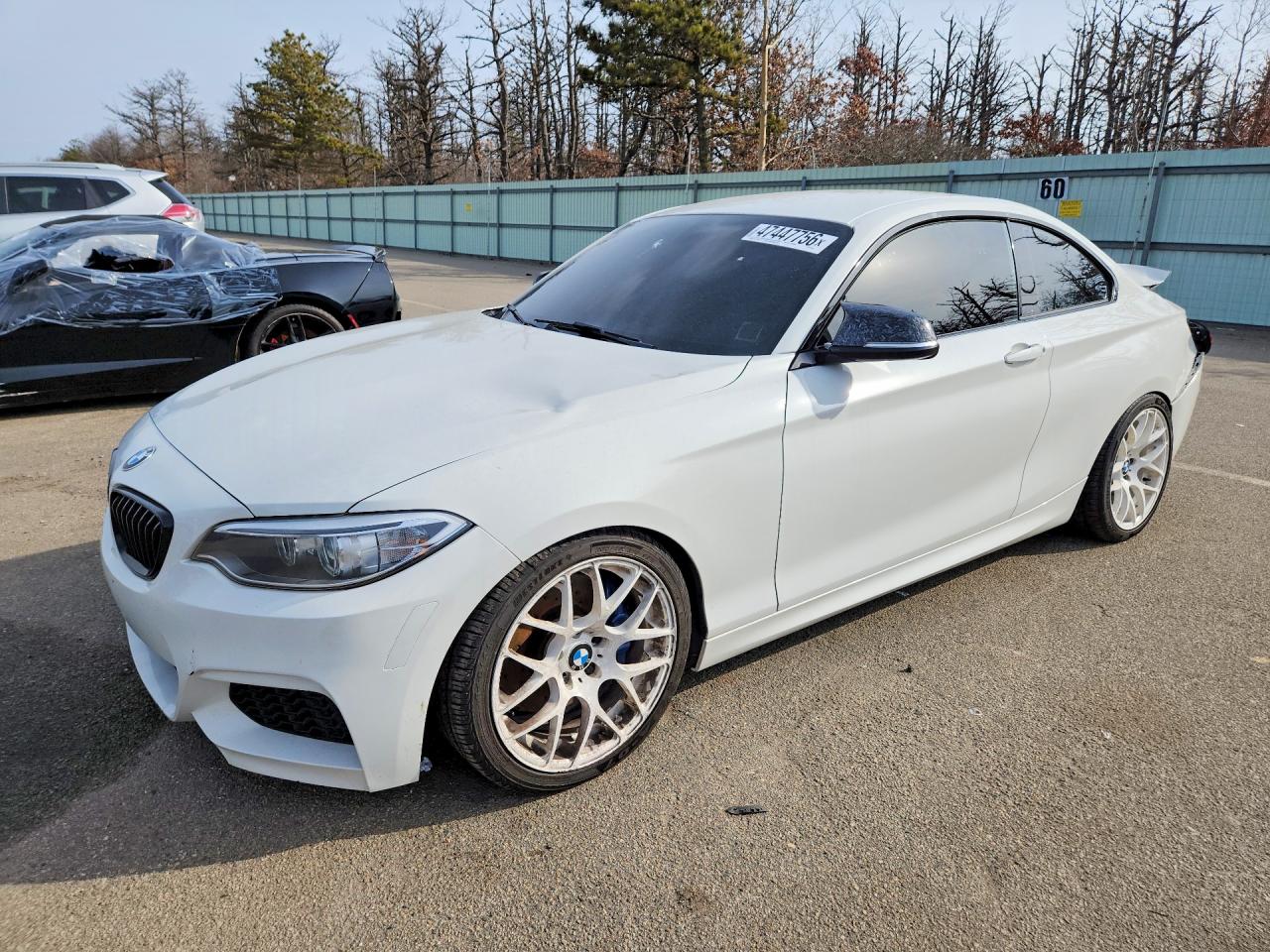 2015 BMW 2 Series M235i, VIN WBA1J7C50FV289049 — Rear end