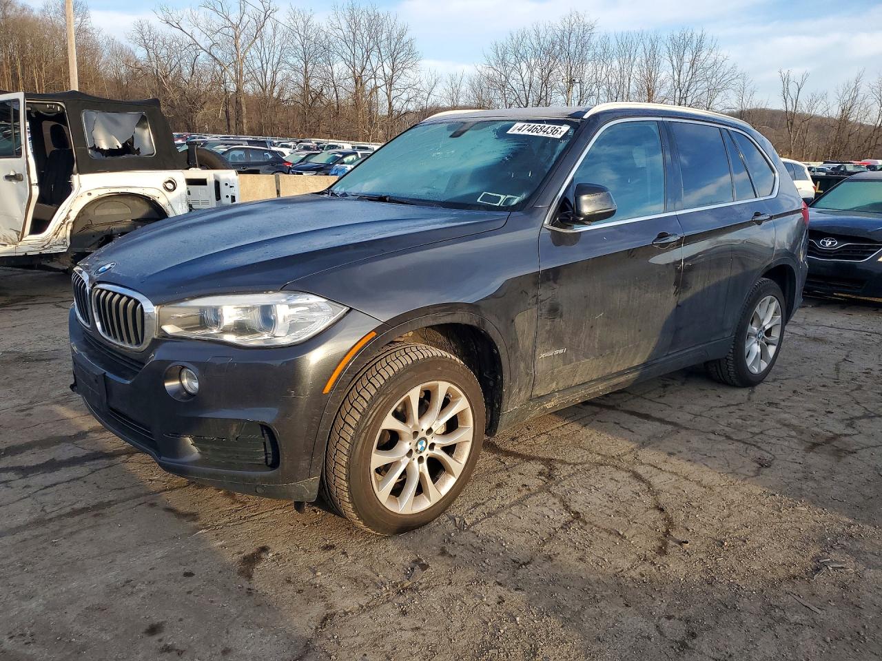 2015 BMW X5 xDrive35i, VIN 5UXKR0C5XF0K69698 — Side