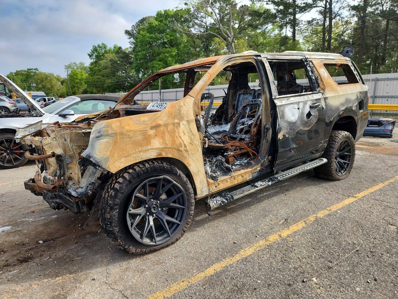 2024 Chevrolet Suburban Z71, VIN 1GNSKDKD1RR129200 — Burn