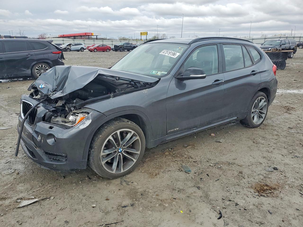 2015 BMW X1 xDrive35i, VIN WBAVM5C50FVV94872 — Front end