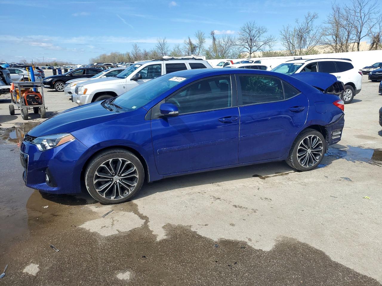 2015 Toyota Corolla LE, VIN 5YFBURHE1FP280284 — Rear end