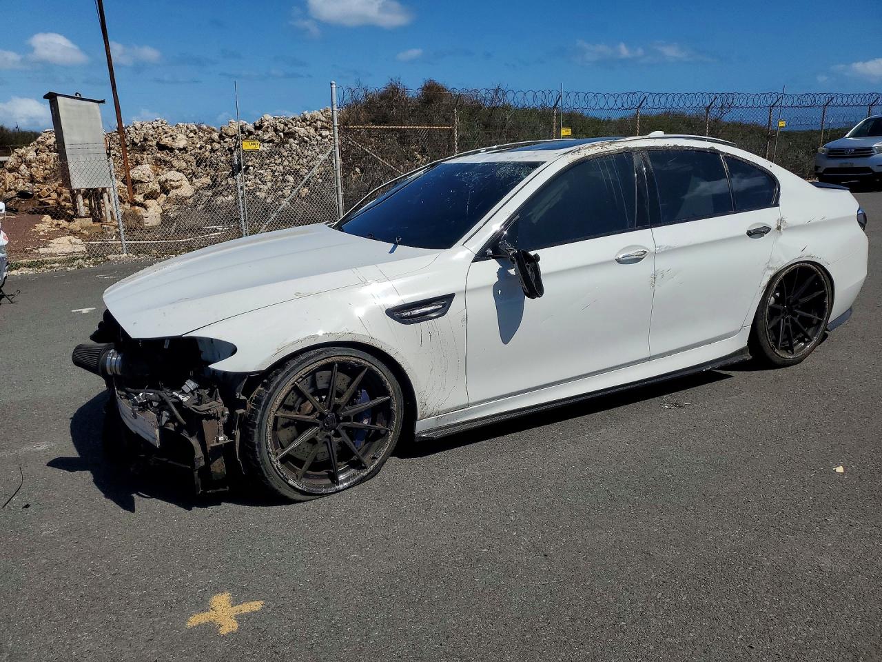 2013 BMW M5, VIN WBSFV9C58DD096104 — Rollover