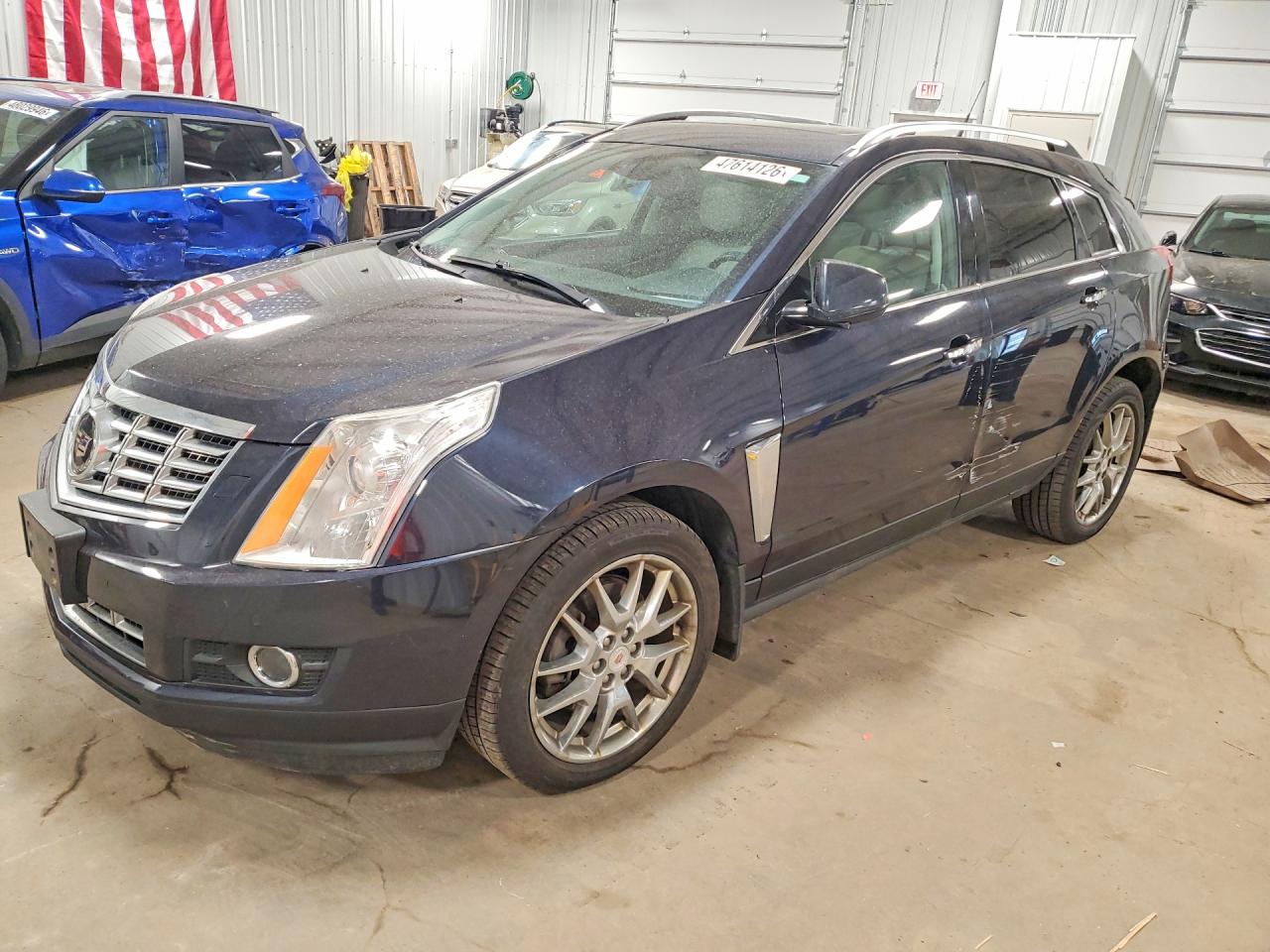 2014 Cadillac SRX Premium Collection, VIN 3GYFNGE35ES580508 — Rear end