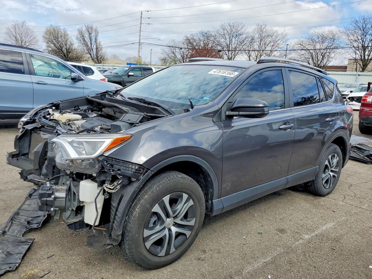 2018 Toyota RAV4 LE, VIN JTMZFREV3JJ211154 — Front end