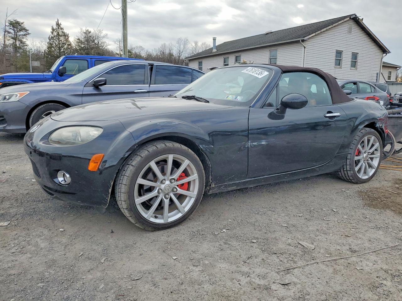 2006 Mazda MX-5 Miata Touring, VIN JM1NC25F960103027 — Side