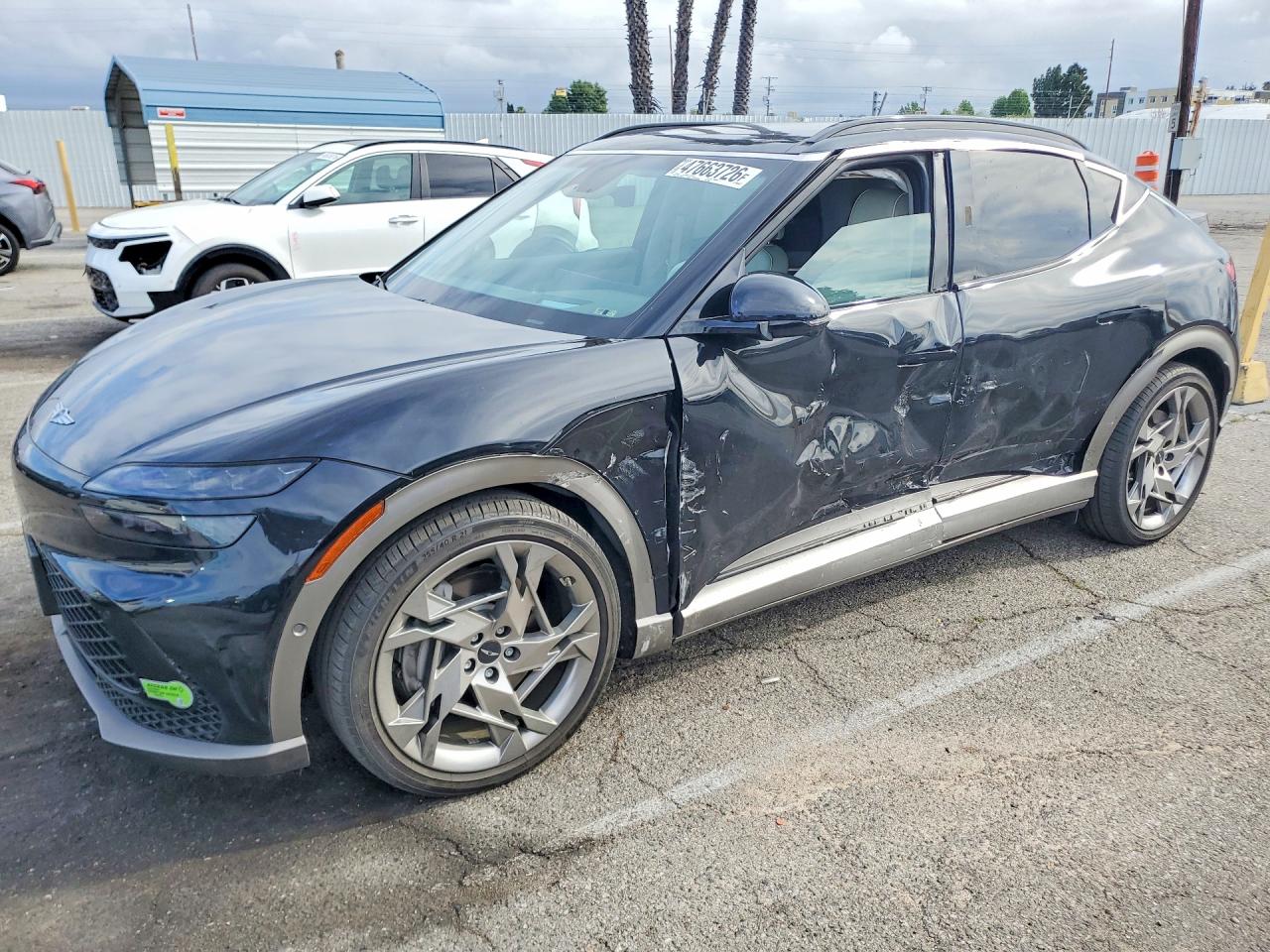 2023 Genesis GV60 Performance, VIN KMUKEDTB4PU009833 — Side