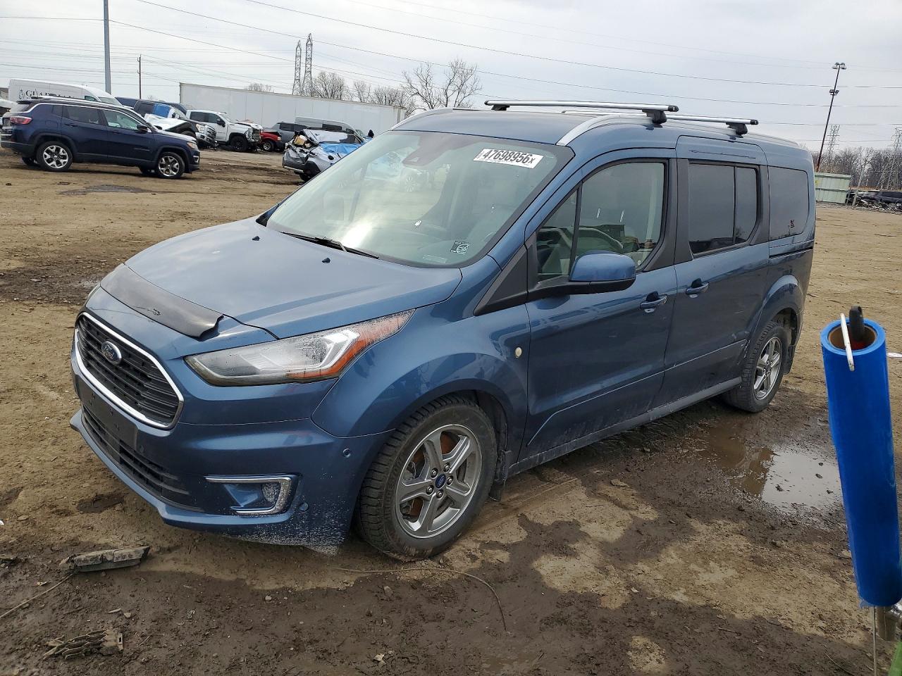 2019 Ford Transit Connect Titanium, VIN NM0GE9G24K1405056 — Side