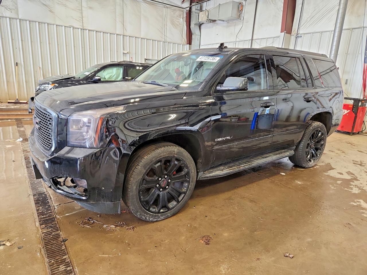 2017 GMC Yukon Denali, VIN 1GKS2CKJ9HR137136 — Side