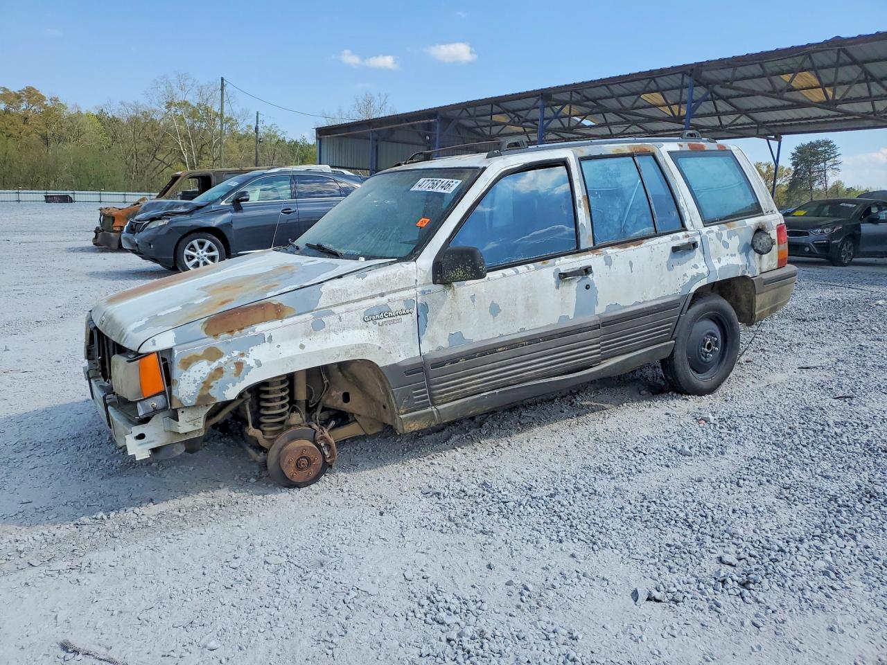 1993 Jeep Grand Cherokee Laredo, VIN 1J4GZ58S9PC714851 — Burn