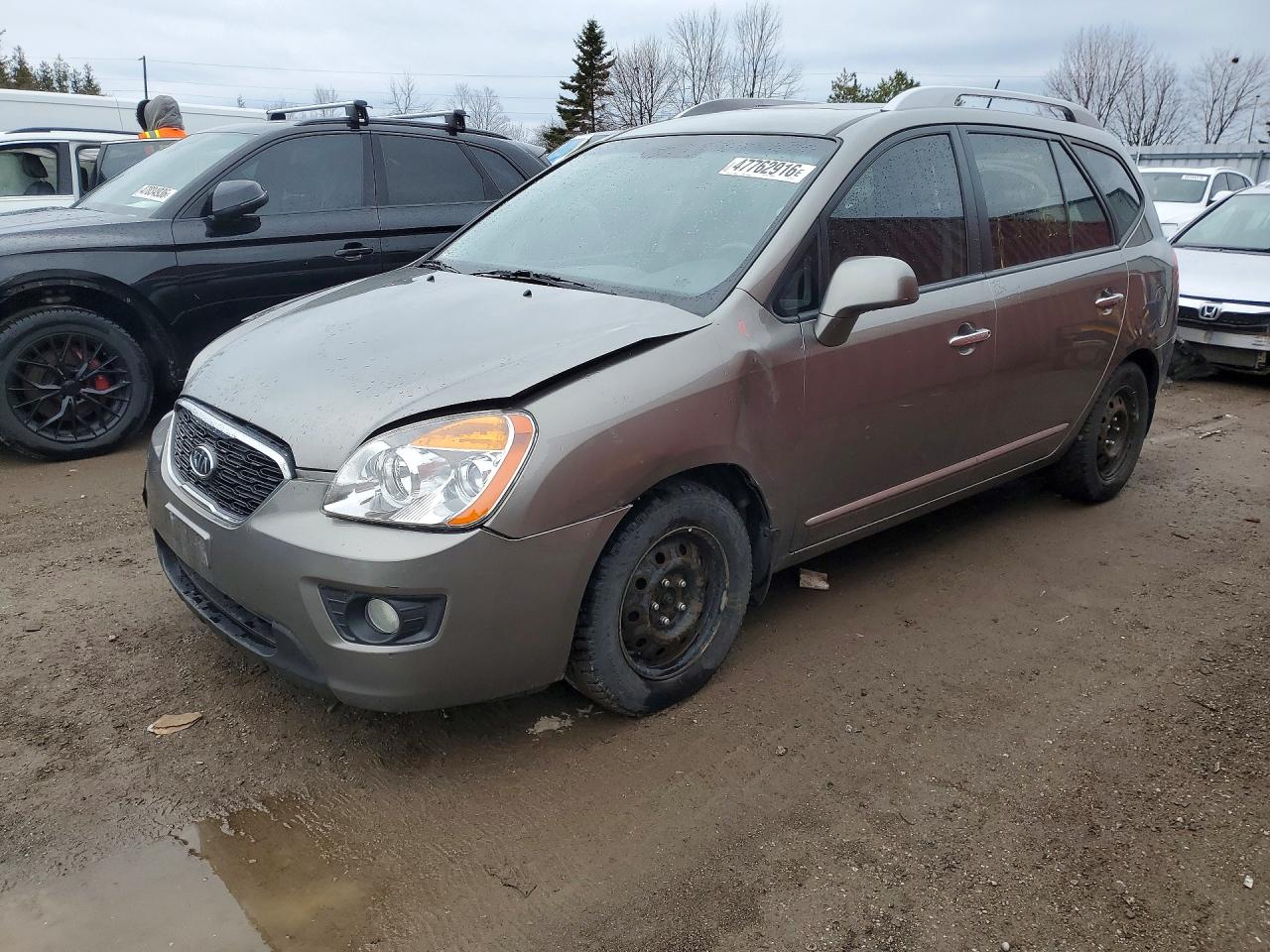 2011 Kia Rondo EX, VIN KNAHH8C60B7360130 — Front end